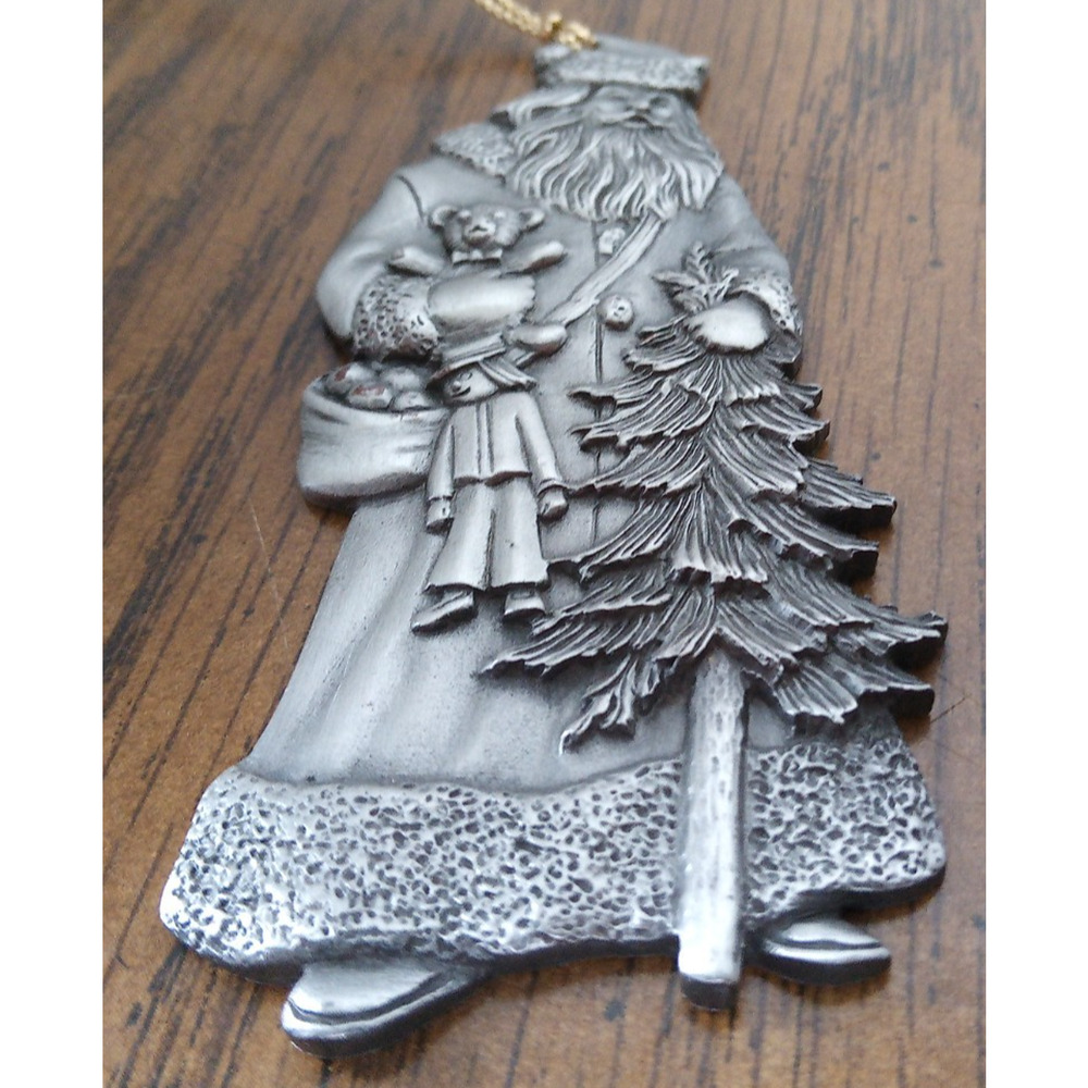 Christmas ornament pewter Avon 1993 Santa with tree & toys CH8524